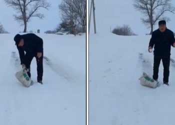 მოხისში მერის წარმომადგენელი ტექნიკურ მარილს ხელით ყრის