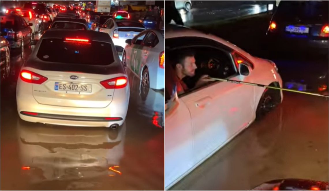 VIDEO: როცა სტიქიის დროსაც არ კარგავ განწყობას – საცობში გაჭედილი ავტომობილის მგზავრი დატბორილ ქუჩაში თევზაობს